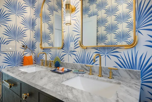 a bedroom with a bed and a chair