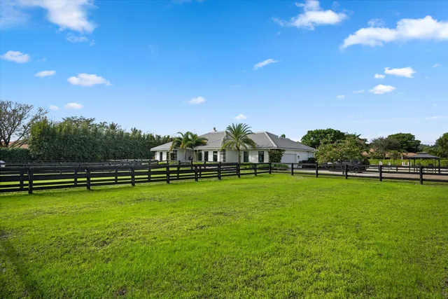 a view of a golf course with a lake