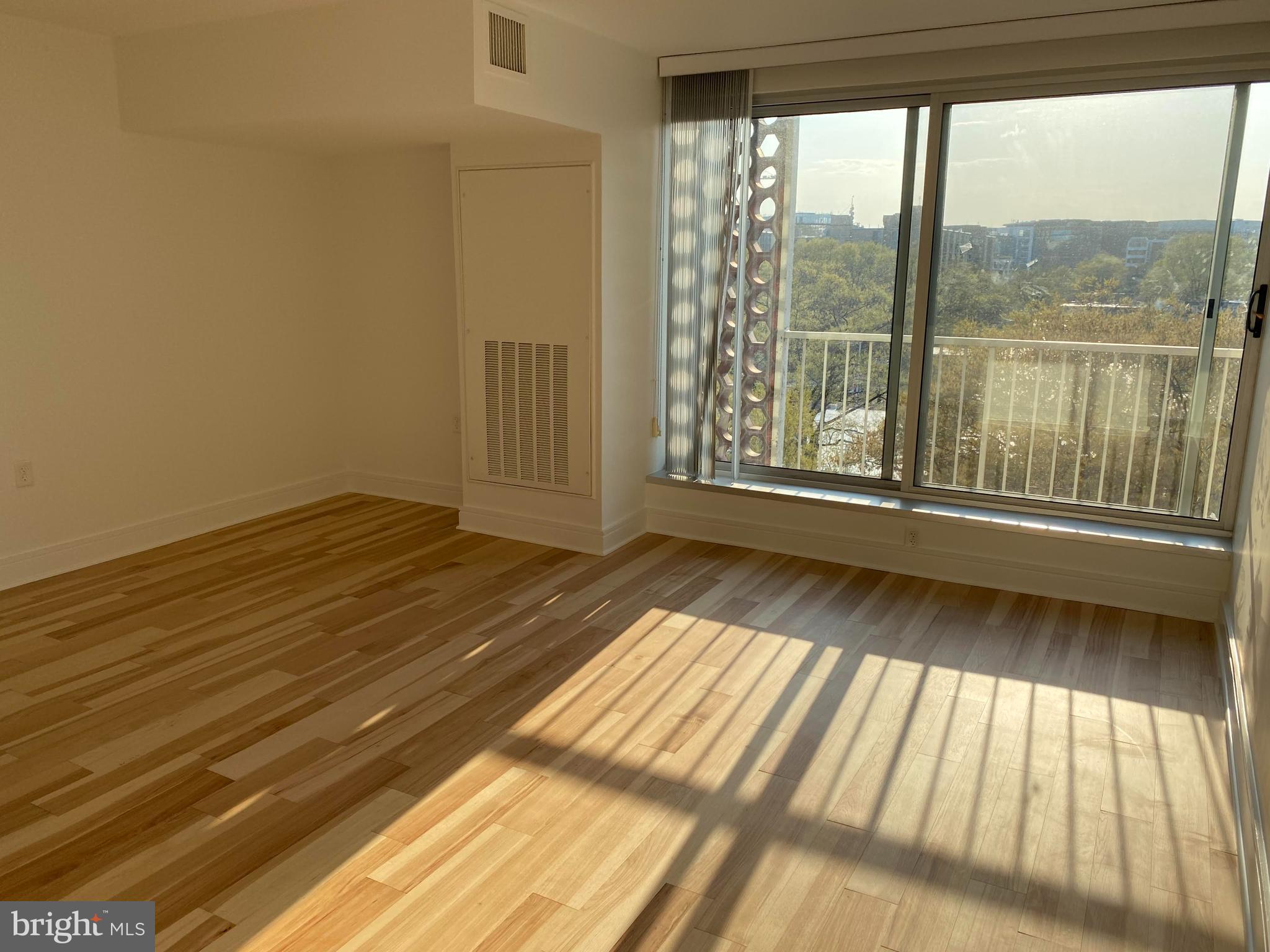 800 4th Street Southwest, Unit S621 Washington, DC 20024 - Photo 9 of 15 a view of empty room with wooden floor and fan