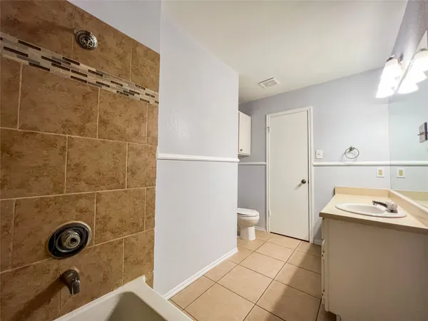 a bathroom with a sink and a shower