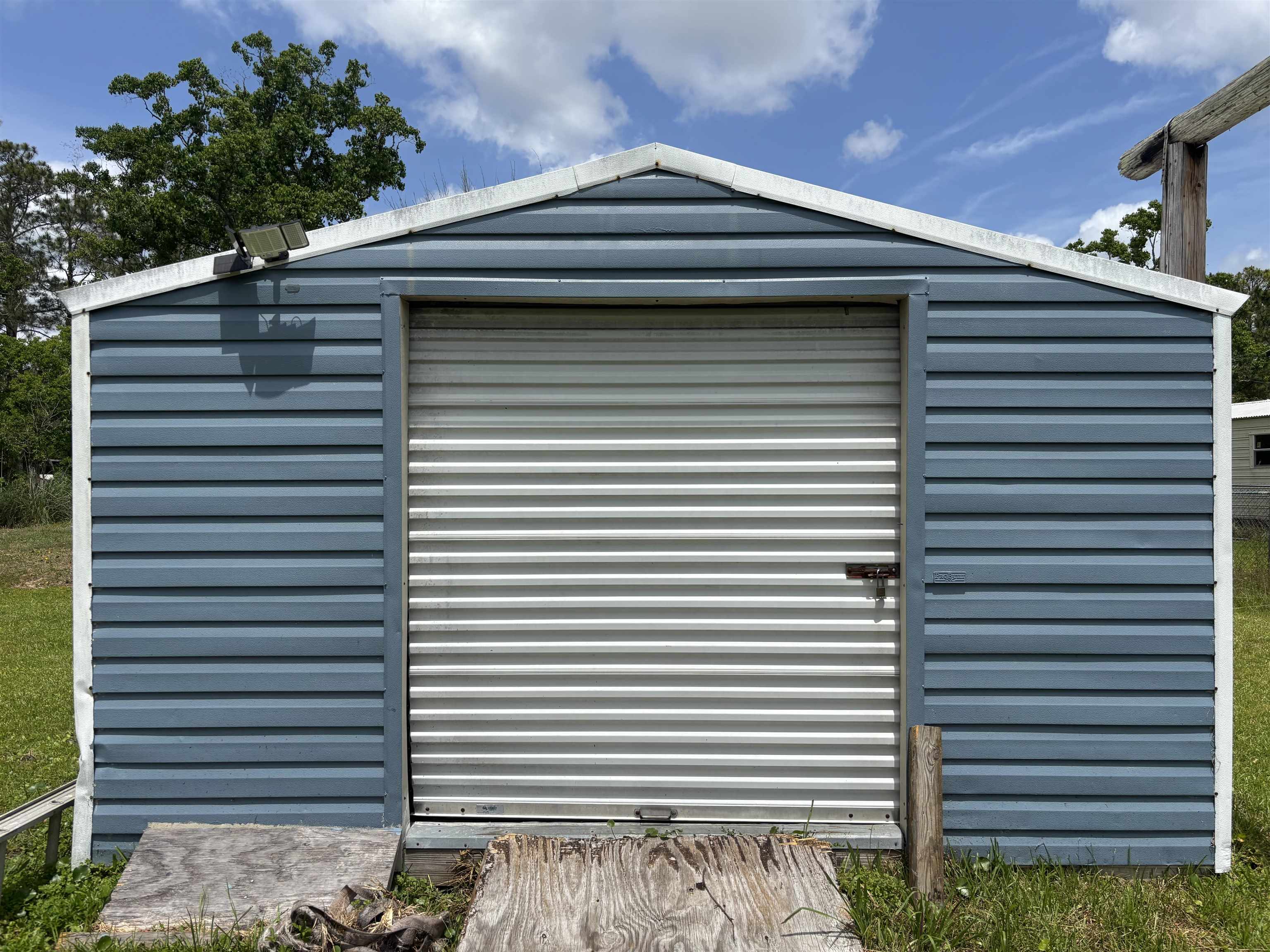 3140 Raulerson Road East St. Augustine, FL 32092 - Photo 11 of 23 a front view of a house with plants