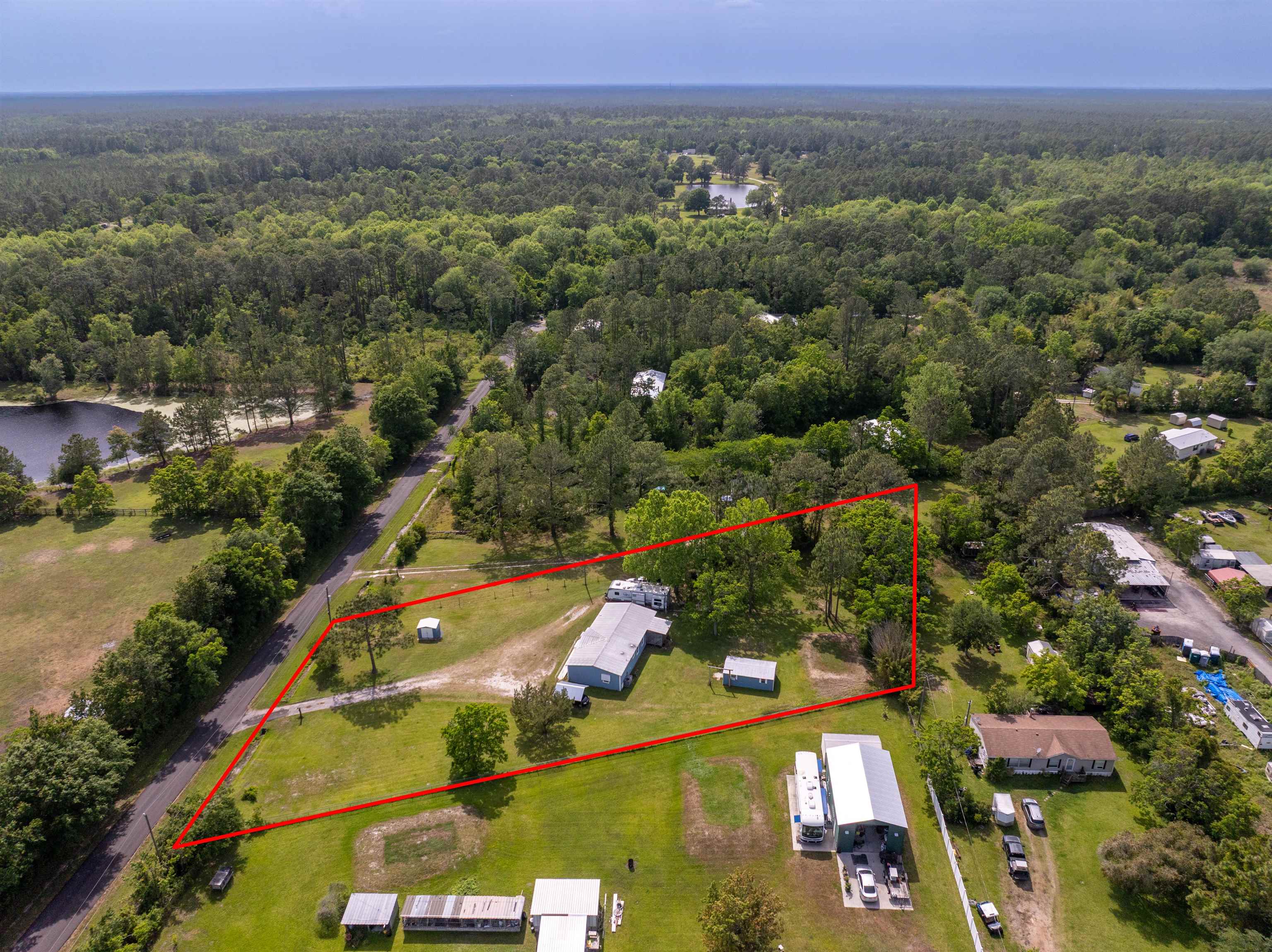 3140 Raulerson Road East St. Augustine, FL 32092 - Photo 18 of 23 an aerial view of a residential houses and city street