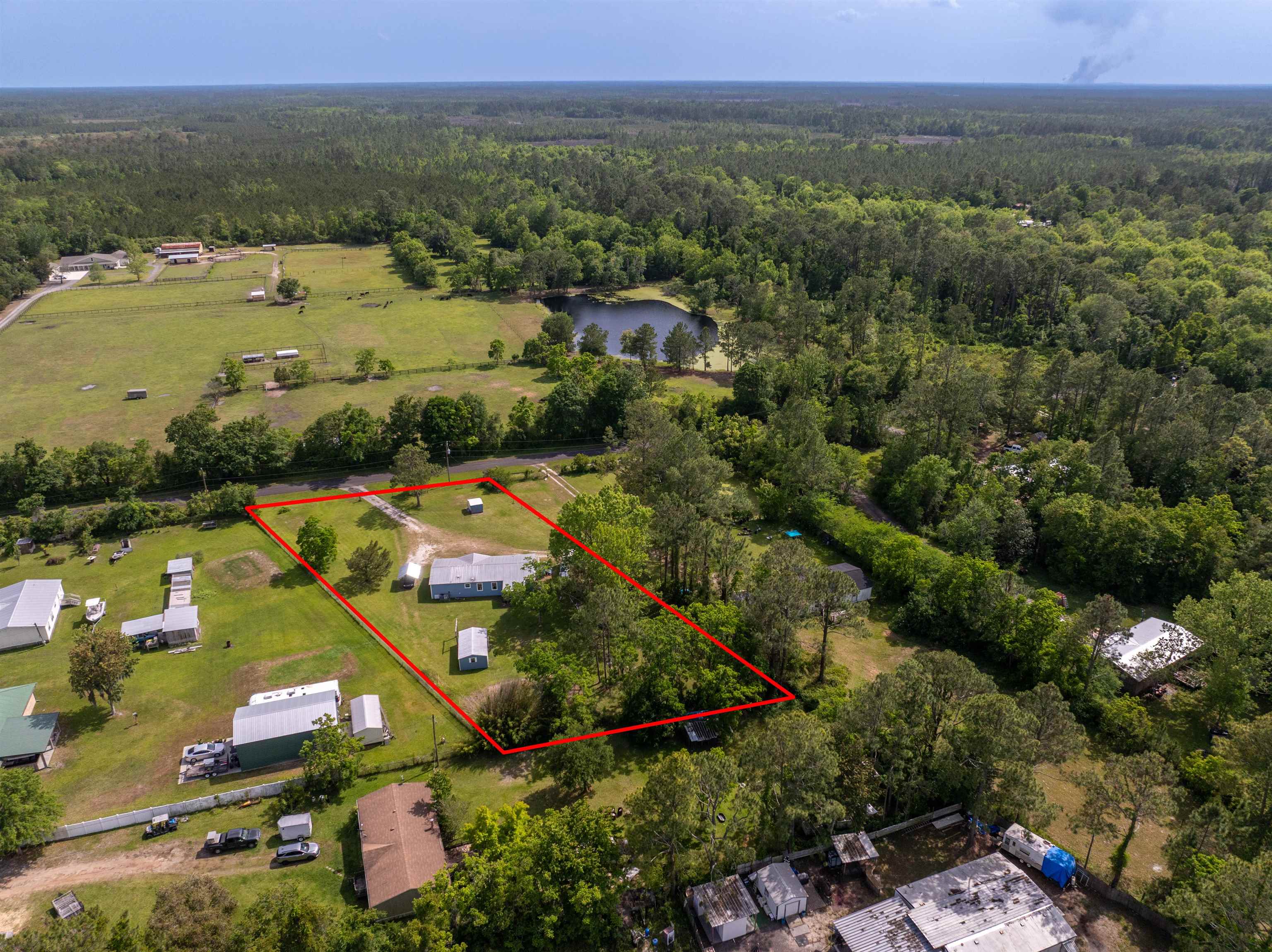 3140 Raulerson Road East St. Augustine, FL 32092 - Photo 19 of 23 an aerial view of multiple house