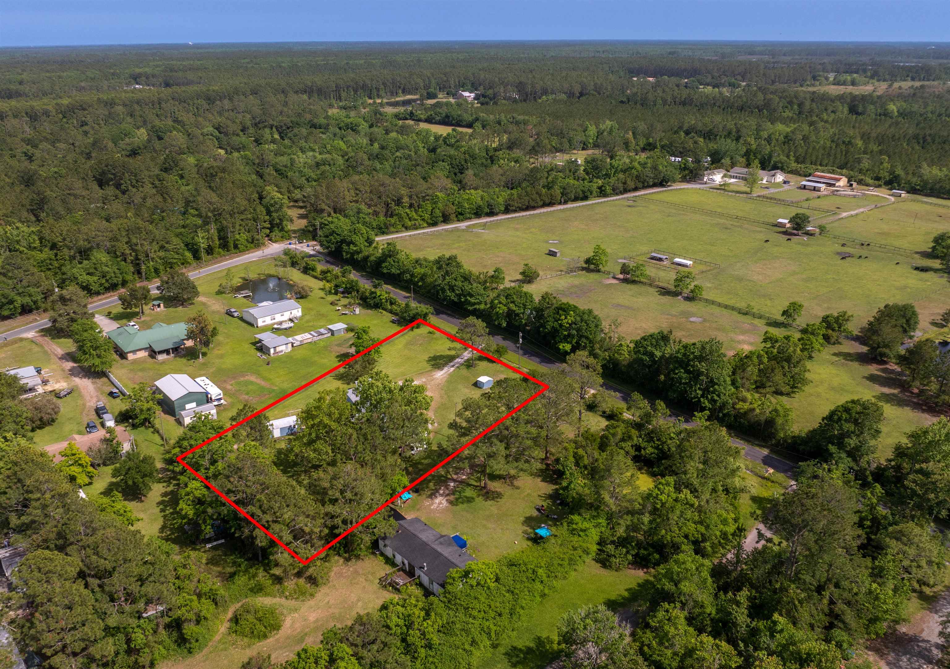 3140 Raulerson Road East St. Augustine, FL 32092 - Photo 20 of 23 an aerial view of a house with a yard