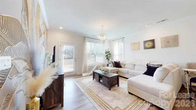 a living room with furniture and a couch