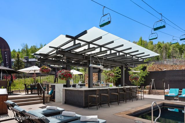 a view of a building with a yard