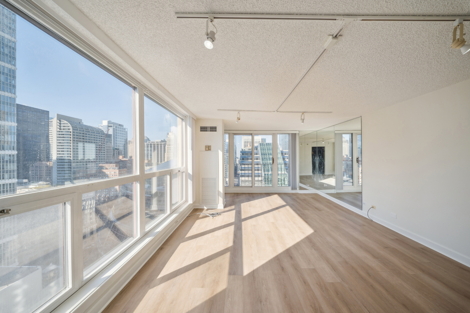 200 North Dearborn Street, Unit 3402 Chicago, IL 60601 - Photo 4 of 18 a view of an entryway with wooden floor