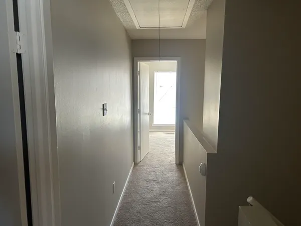 a view of a hallway with a elevator
