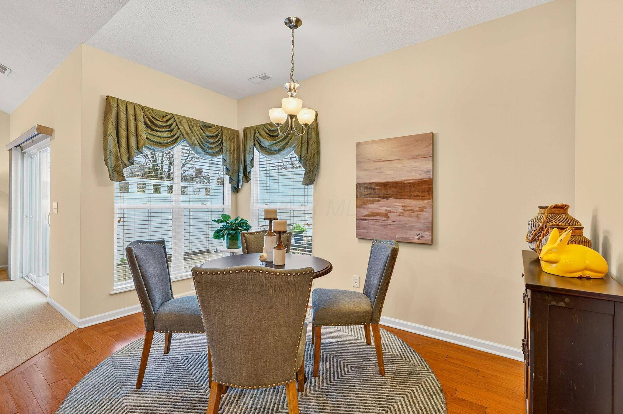 6931 Rothwell Street New Albany, OH 43054 - Photo 22 of 58 Dining room with chandelier