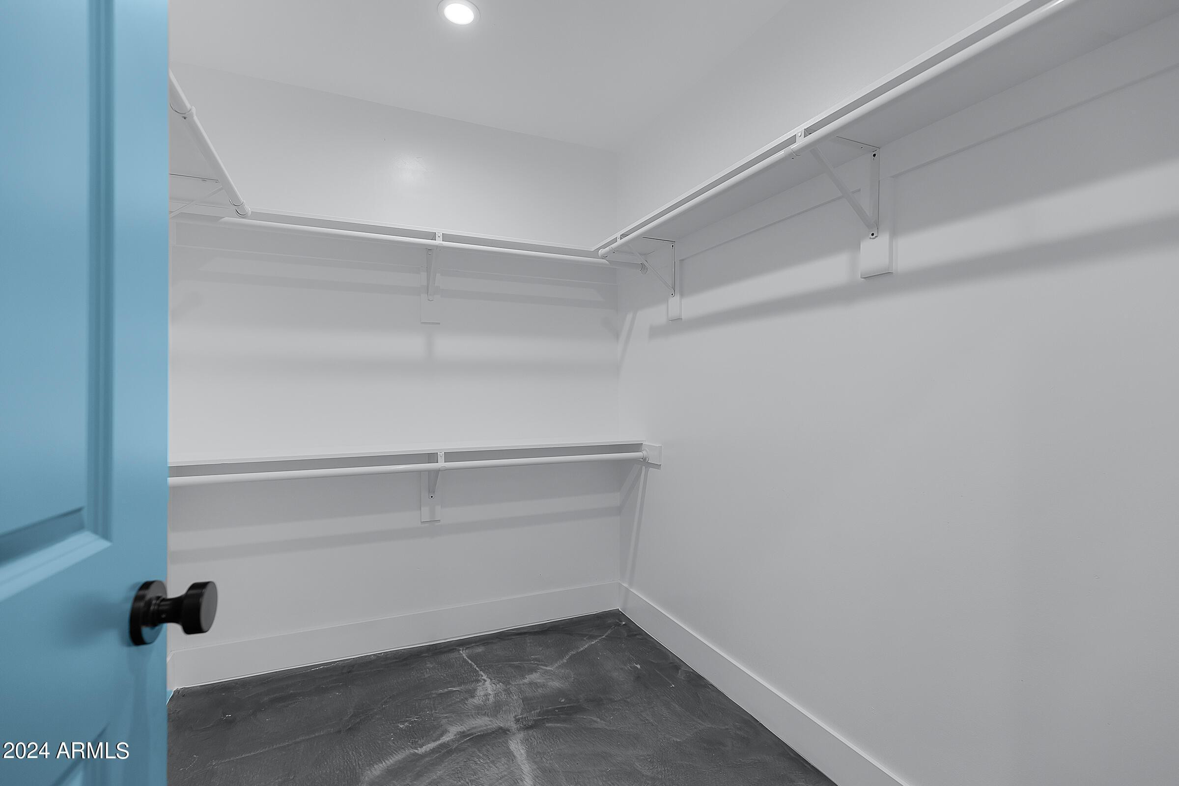7308 East Granada Road Scottsdale, AZ 85257 - Photo 19 of 39 a view of an empty walk in closet