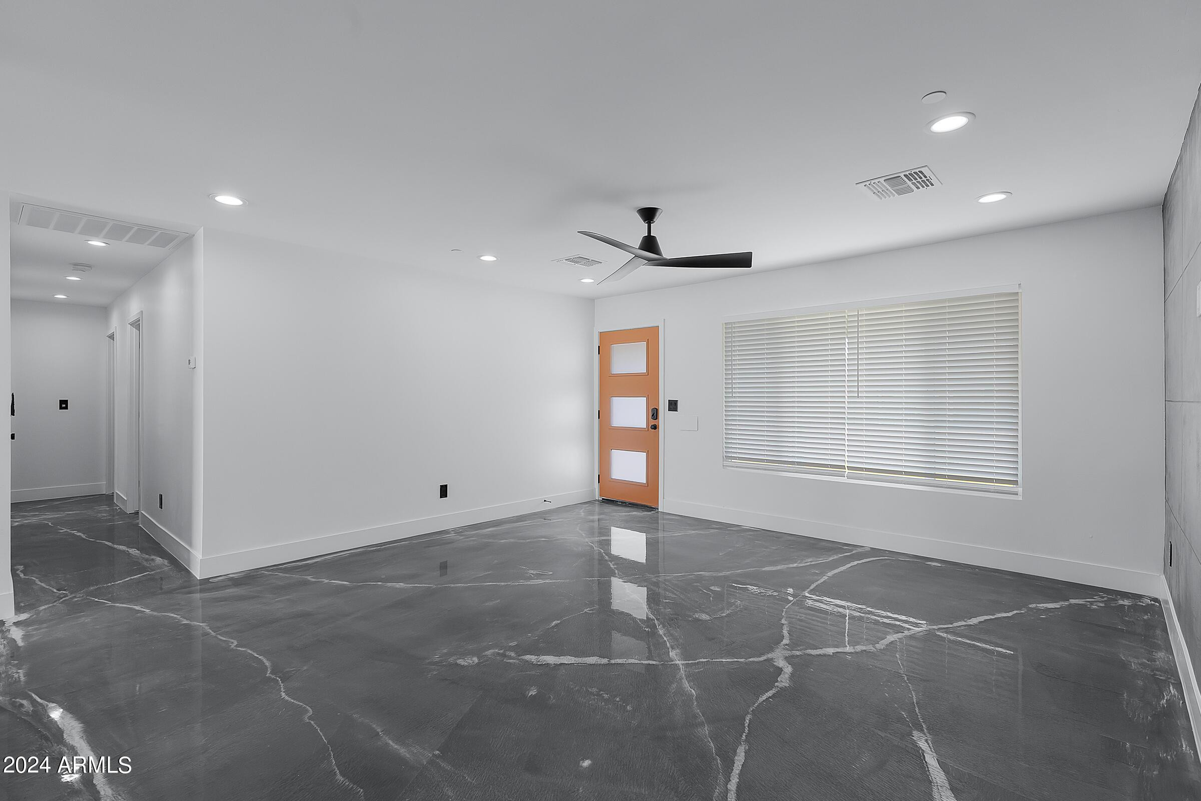 7308 East Granada Road Scottsdale, AZ 85257 - Photo 5 of 39 a view of an empty room with a window