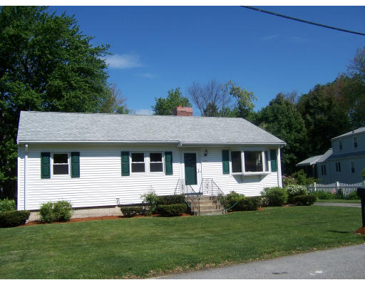 10 Melo Road Woburn, MA 01801 - Photo 2 of 3 a front view of a house with a yard