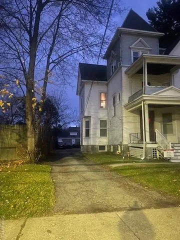 a view of a house with a swimming pool