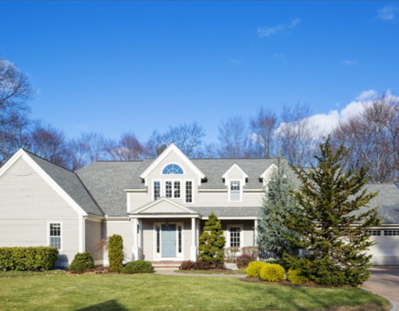 3 Turnburry Hill Road, Unit 3 Lexington, MA 02421 - Photo 1 of 14 a front view of a residential houses with yard and green space