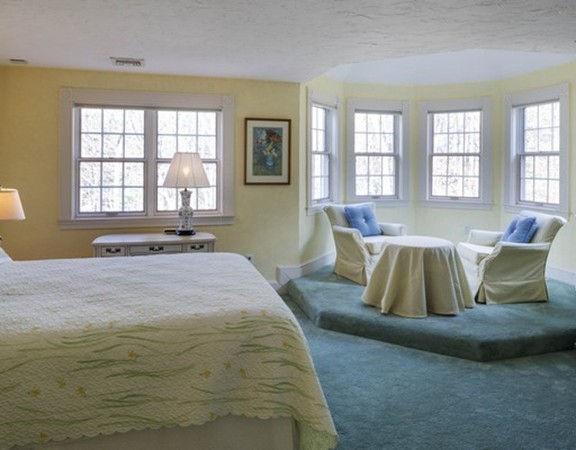 3 Turnburry Hill Road, Unit 3 Lexington, MA 02421 - Photo 11 of 14 a bed room with a bed and a couch