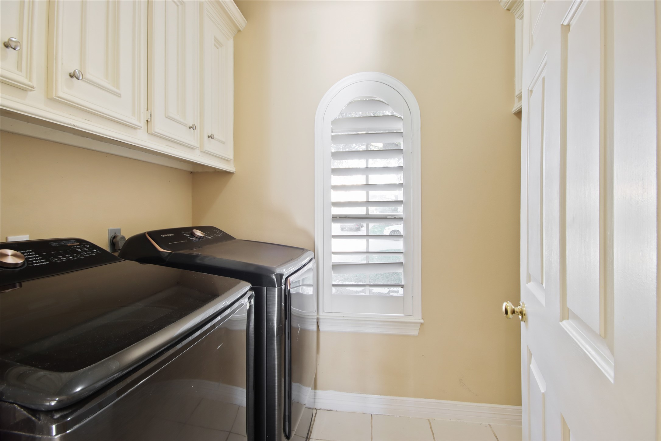 8411 Rockford Hall Drive Spring, TX 77379 - Photo 28 of 32 A well-appointed walk-in utility room offering added convenience and organization, designed to support daily routines with ease while keeping the home running smoothly.