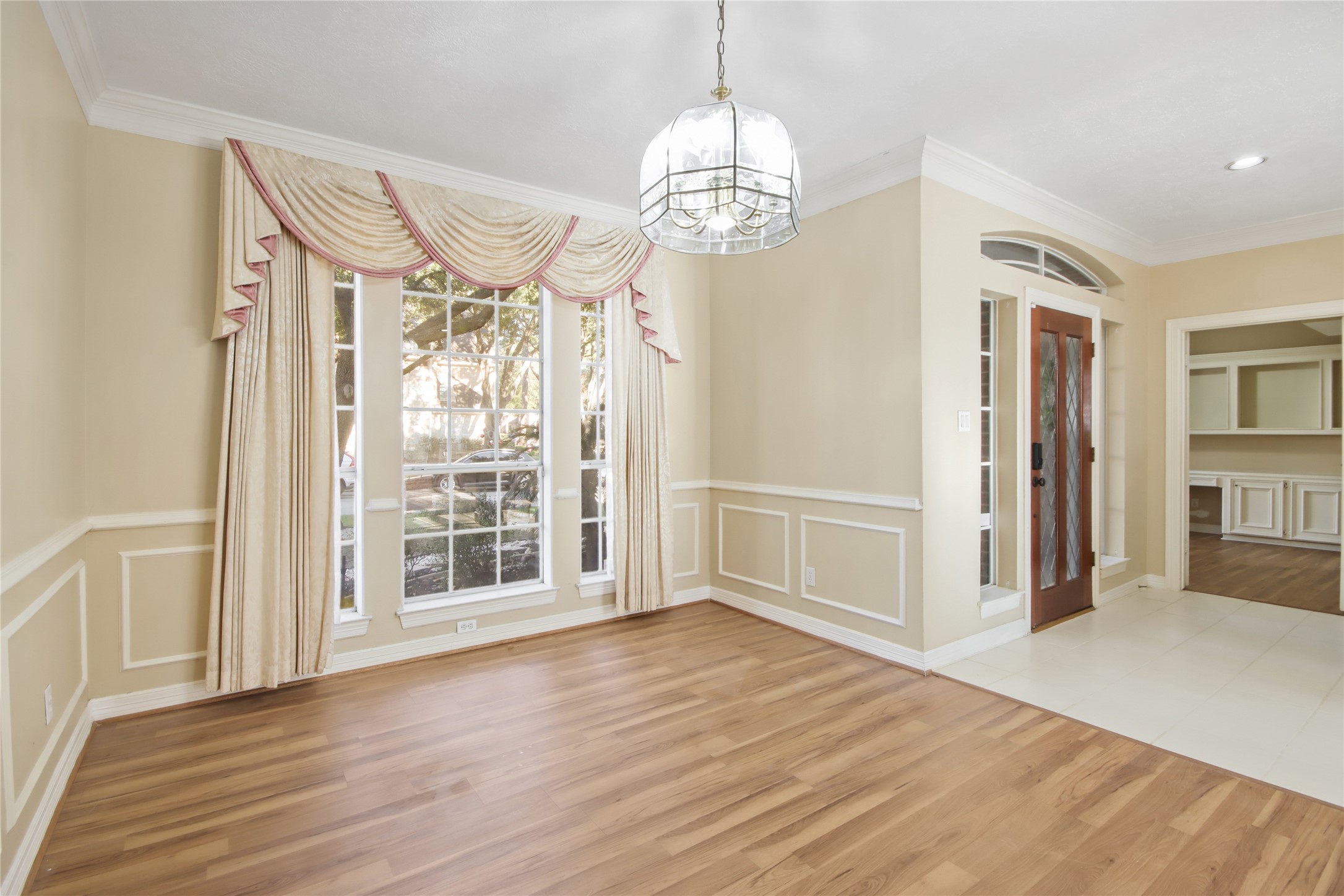 8411 Rockford Hall Drive Spring, TX 77379 - Photo 7 of 32 A refined formal dining room ideal for hosting gatherings and special occasions, offering an elegant setting that complements the home’s sophisticated design.