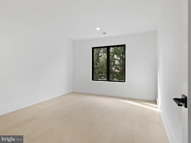 a bathroom with a shower and a toilet