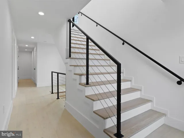 a backyard of a house with outdoor seating