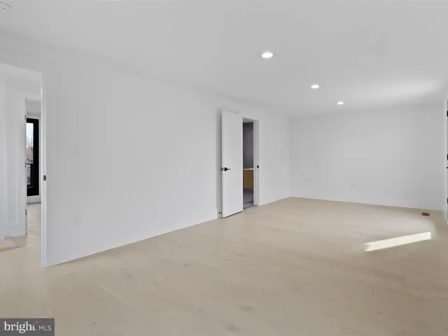 a view of balcony with wooden floor