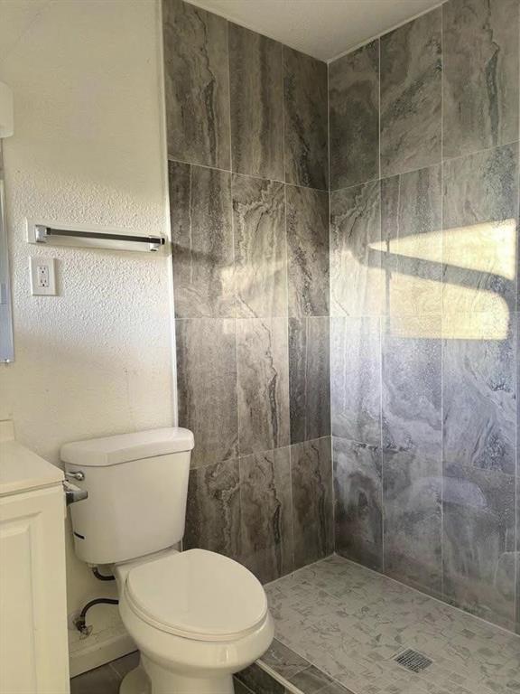 3443 Hyland Drive Decatur, GA 30032 - Photo 14 of 23 a bathroom with a toilet and a shower