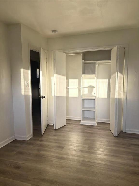 3443 Hyland Drive Decatur, GA 30032 - Photo 20 of 23 an empty room with wooden floor and windows