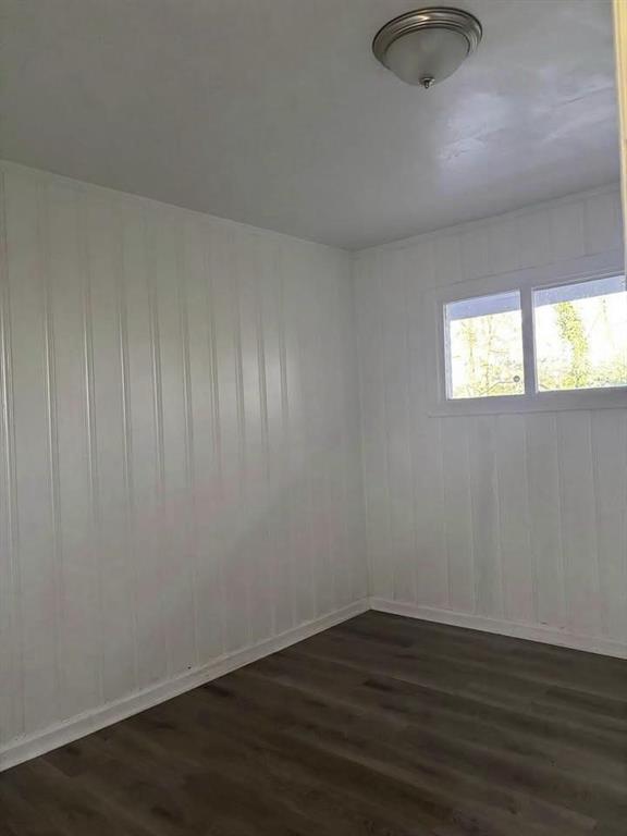 3443 Hyland Drive Decatur, GA 30032 - Photo 23 of 23 a view of an empty room with wooden floor and a window