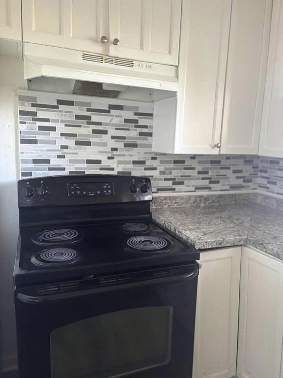 3443 Hyland Drive Decatur, GA 30032 - Photo 10 of 23 a stove top oven sitting inside of a kitchen