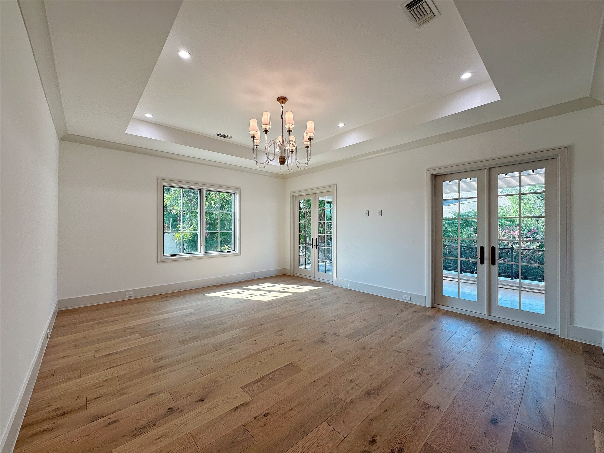 3818 Drake Street Houston, TX 77005 - Photo 25 of 31 an empty room with wooden floor and windows