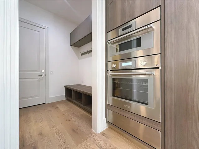 a kitchen with a stove and a microwave