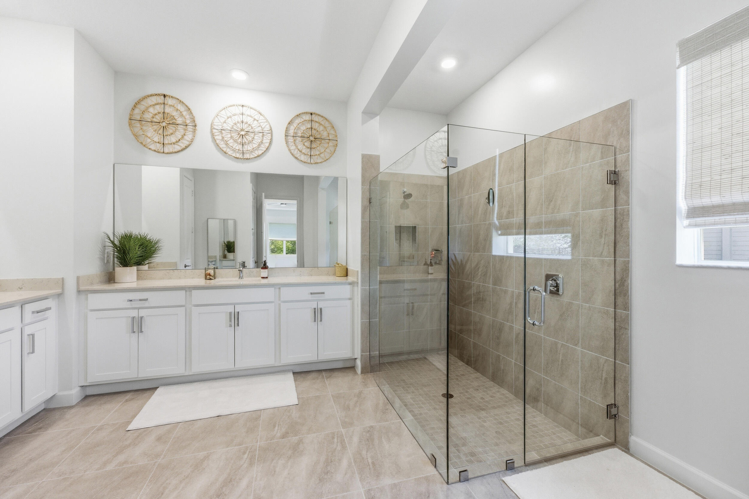 19230 Rolling Acres Road Loxahatchee, FL 33470 - Photo 6 of 58 a bathroom with a mirror a sink and a shower