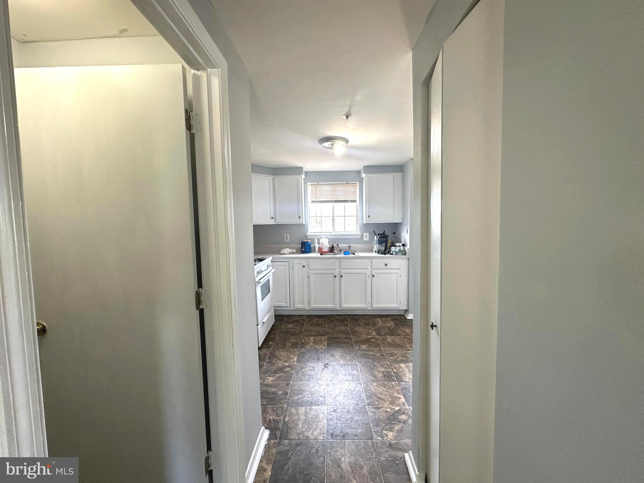 3426 Round Road Baltimore, MD 21225 - Photo 8 of 38 Vinyl Tile in Kitchen and DR