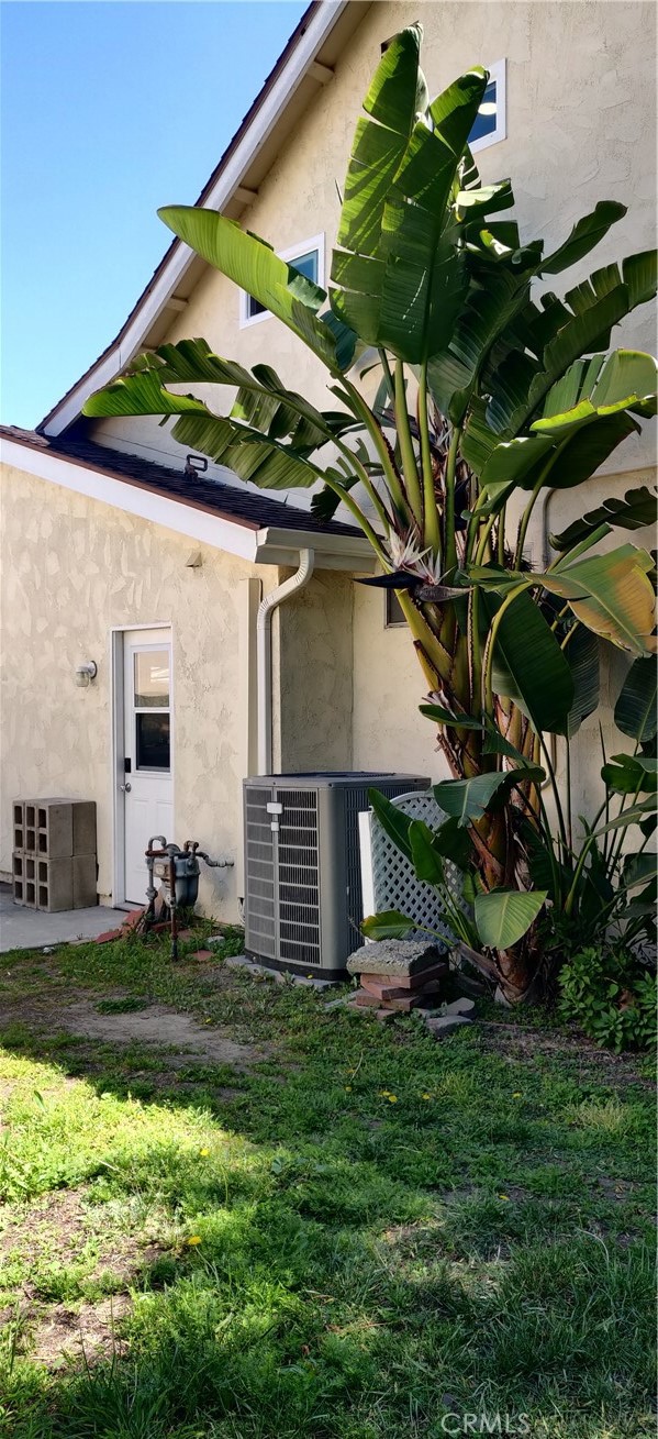9894 Spruce Court Cypress, CA 90630 - Photo 22 of 22 a view of a house with a yard