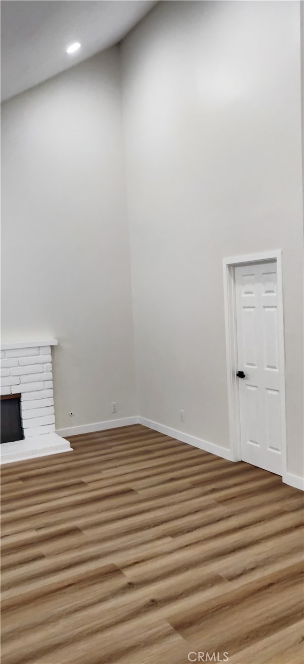 9894 Spruce Court Cypress, CA 90630 - Photo 4 of 22 a view of wooden floor and windows in a room