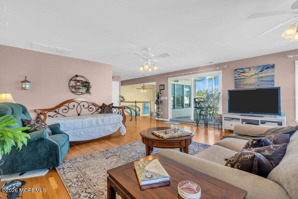 2111 Middle Avenue Point Pleasant, NJ 08742 - Photo 11 of 51 a living room with furniture and a flat screen tv