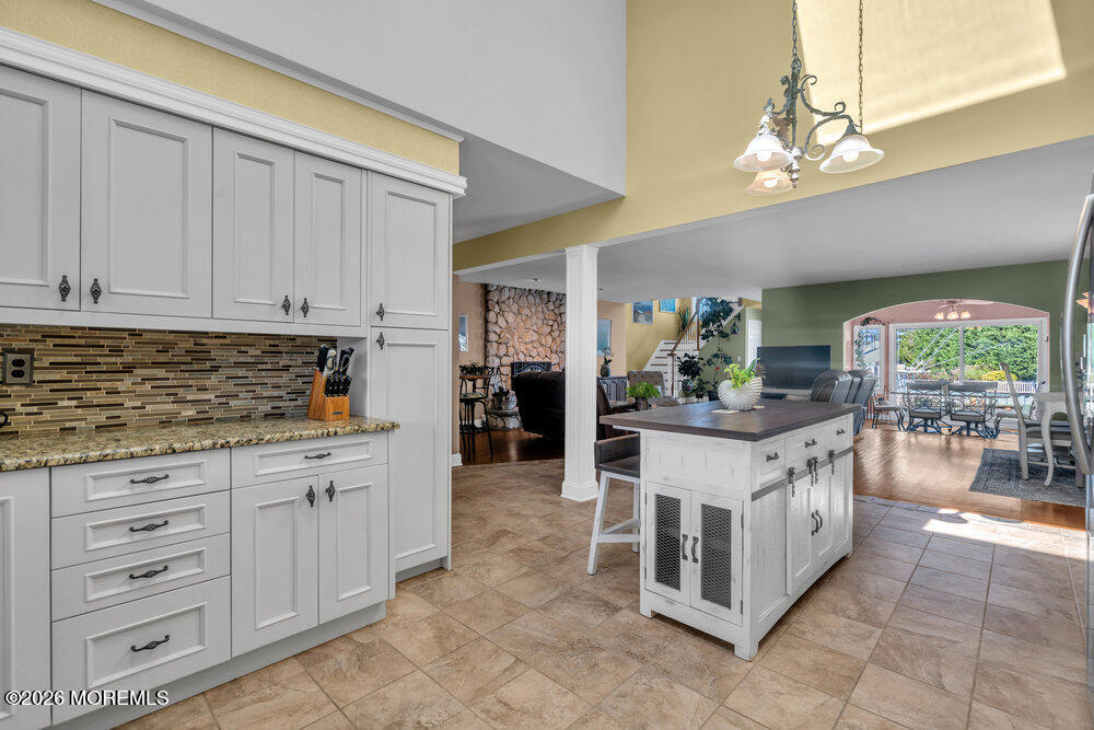 2111 Middle Avenue Point Pleasant, NJ 08742 - Photo 16 of 51 a kitchen with stainless steel appliances a sink and cabinets