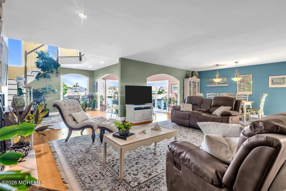 2111 Middle Avenue Point Pleasant, NJ 08742 - Photo 17 of 51 a living room with furniture and a flat screen tv