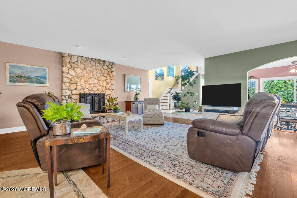 2111 Middle Avenue Point Pleasant, NJ 08742 - Photo 18 of 51 a living room with fireplace furniture and a flat screen tv