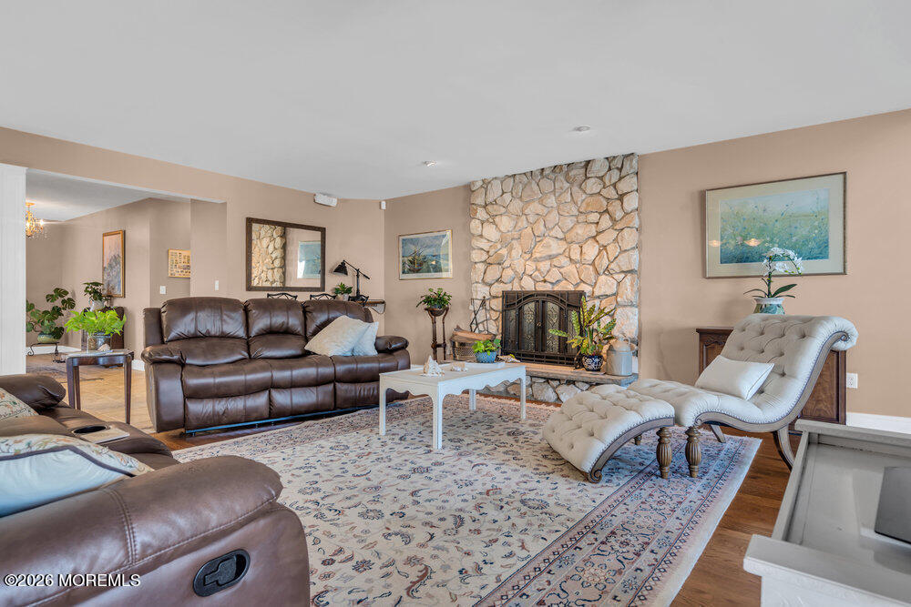 2111 Middle Avenue Point Pleasant, NJ 08742 - Photo 19 of 51 a living room with furniture and a fireplace