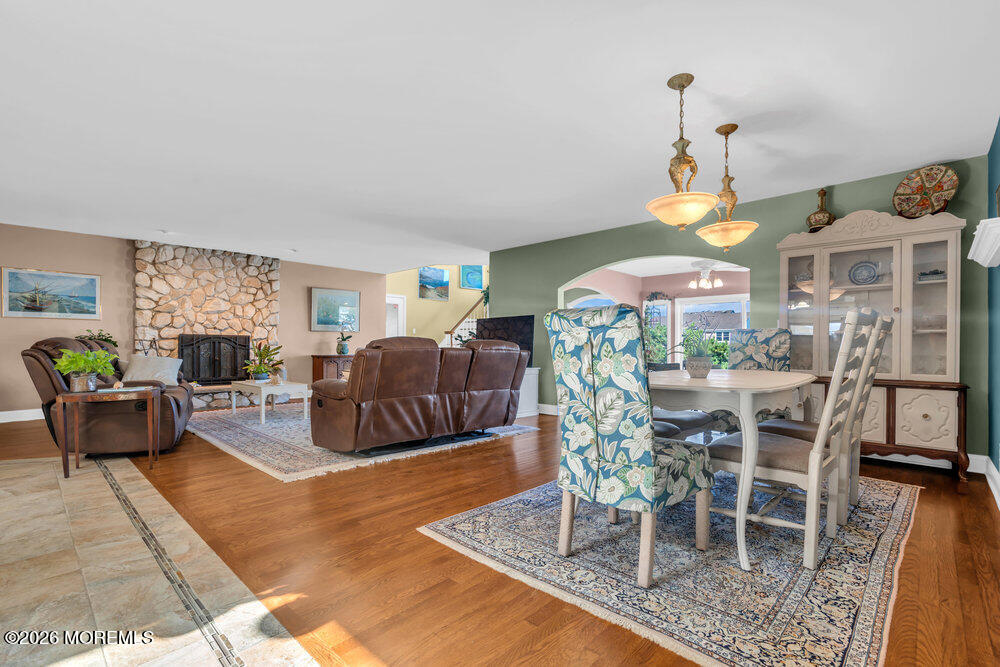2111 Middle Avenue Point Pleasant, NJ 08742 - Photo 20 of 51 a living room with furniture a dining table and kitchen view