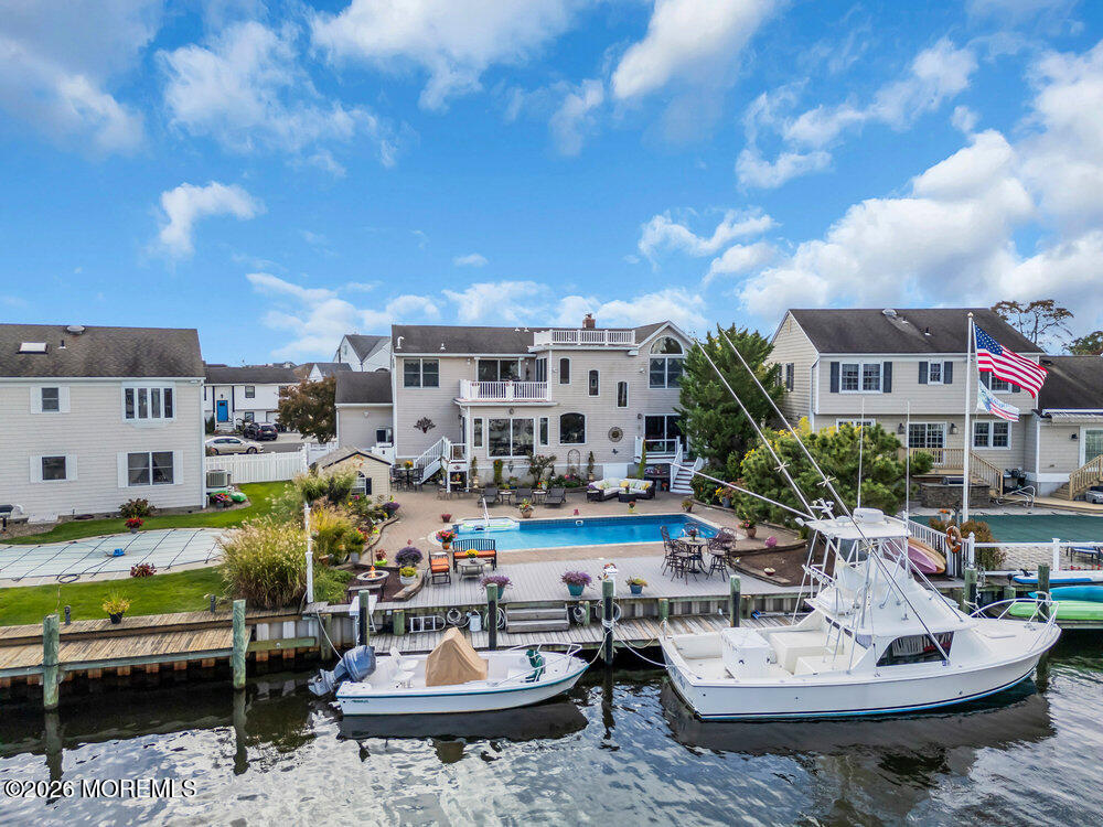 2111 Middle Avenue Point Pleasant, NJ 08742 - Photo 2 of 51 a view of a patio with swimming pool and fire pit