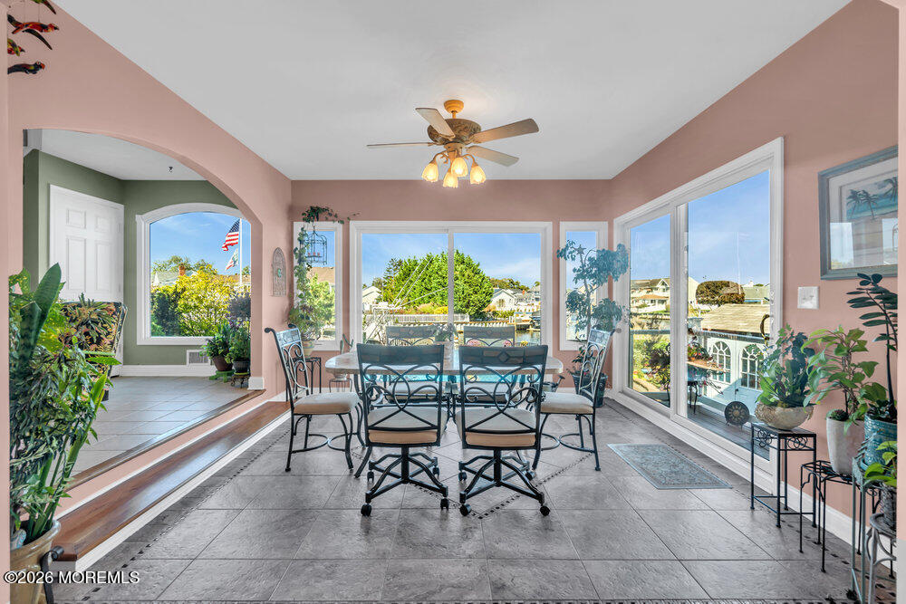 2111 Middle Avenue Point Pleasant, NJ 08742 - Photo 21 of 51 a dining room filled with furniture and a potted plant