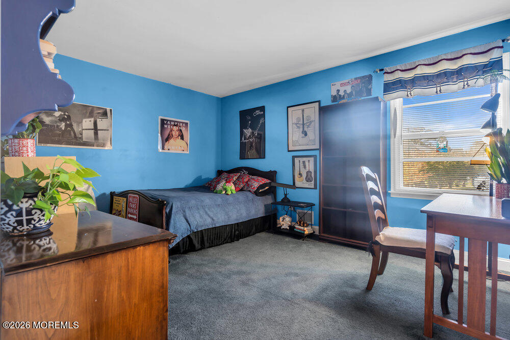 2111 Middle Avenue Point Pleasant, NJ 08742 - Photo 28 of 51 a bedroom with furniture and a bed