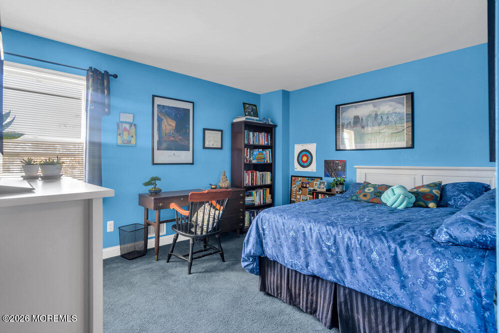 2111 Middle Avenue Point Pleasant, NJ 08742 - Photo 31 of 51 a bedroom with a bed and a desk