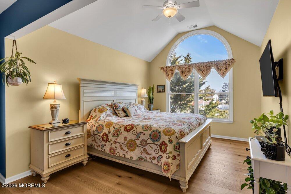 2111 Middle Avenue Point Pleasant, NJ 08742 - Photo 35 of 51 a bedroom with a bed and a flat screen tv