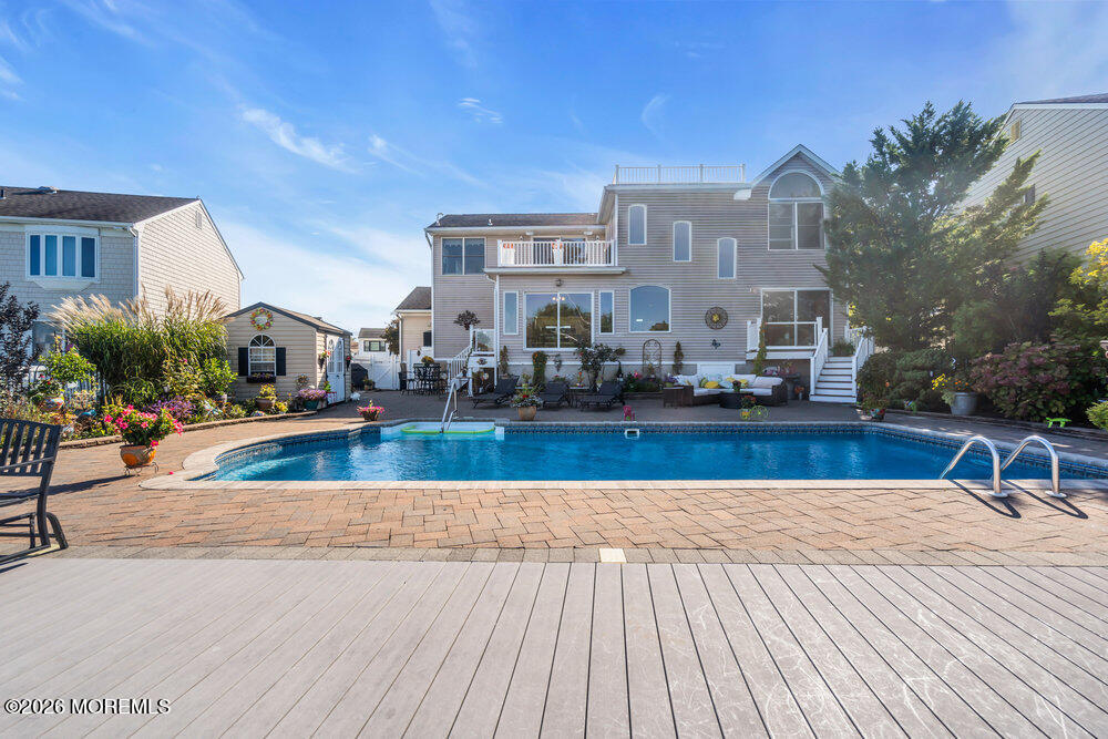 2111 Middle Avenue Point Pleasant, NJ 08742 - Photo 43 of 51 a view of balcony with a table and chairs