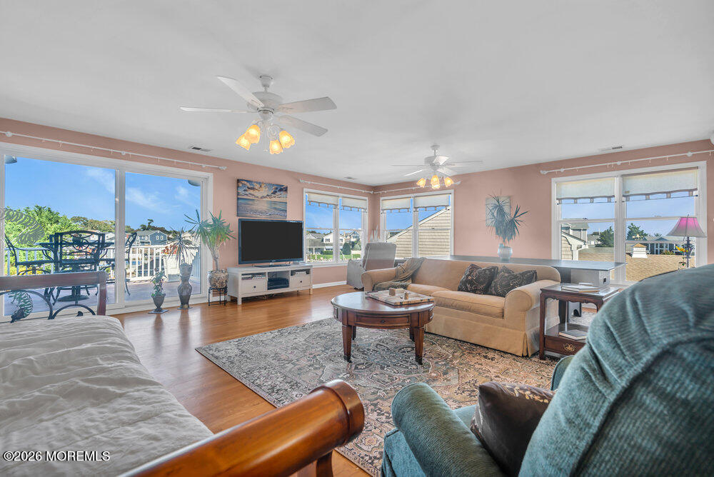 2111 Middle Avenue Point Pleasant, NJ 08742 - Photo 9 of 51 a living room with furniture and a flat screen tv