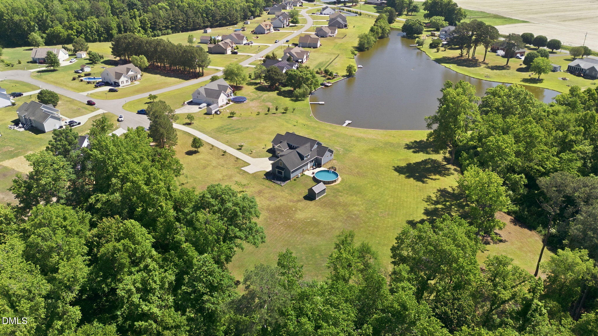 35 North Rippling Court Smithfield, NC 27577 - Photo 56 of 59 an aerial view of residential houses with outdoor space