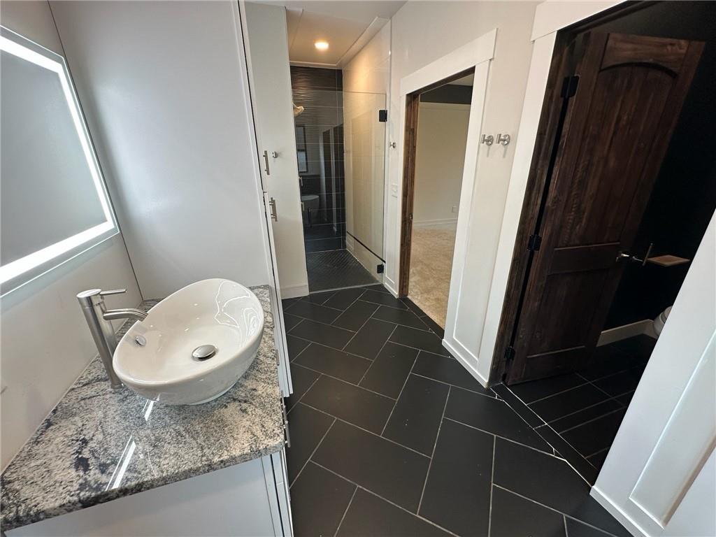 1001 Bailey Road Rome, GA 30161 - Photo 10 of 44 a bathroom with a granite countertop sink toilet and shower