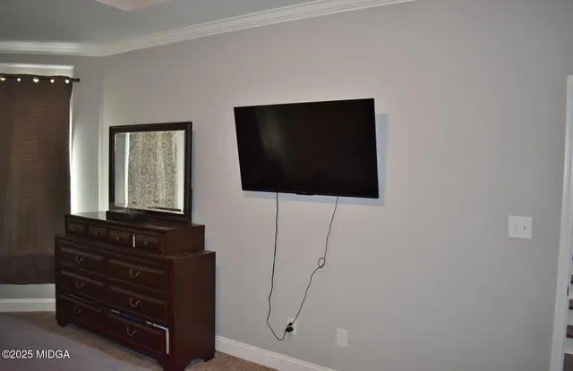 a view of a elevator with wooden floor